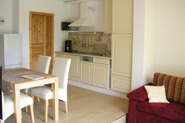 Wohnraum mit offener Küche und Essbereich - Ferienhaus Jackl in Rathmannsdorf - Sächsische Schweiz